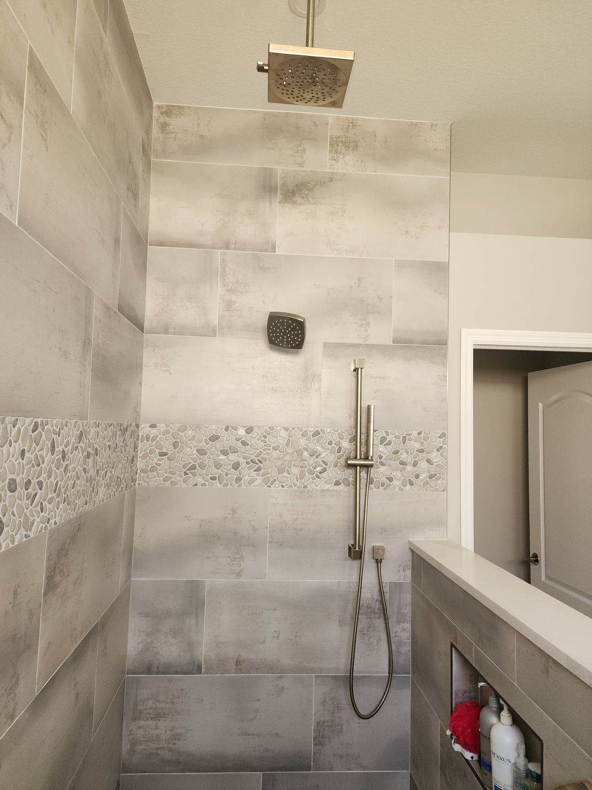 Walk-in tile shower built by M&M Builds